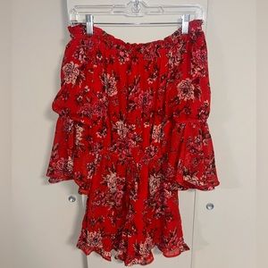 Red floral off the shoulder romper from American Eagle Outfitters.